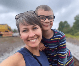 Sonja Tengblad smiling with her child